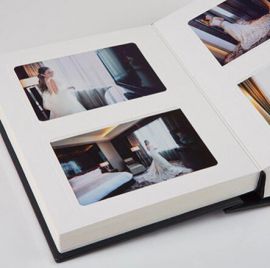 Album photos awaiting careful removal