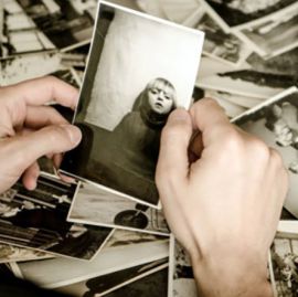 Loose photos being prepared for scanning